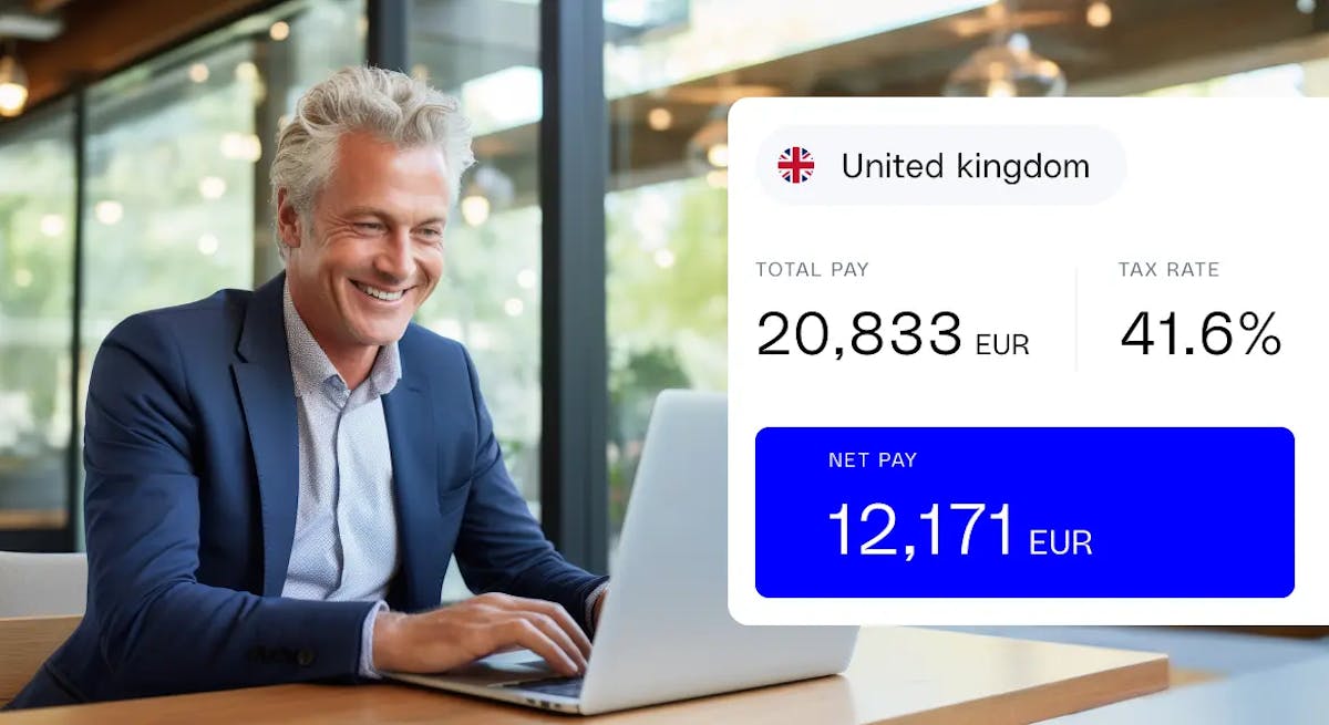 A man at a laptop viewing his UK payroll information within the G-P platform